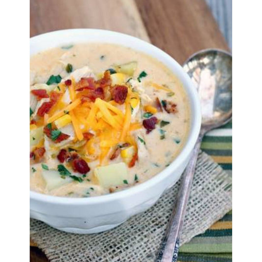 Baked Potato Soup- Creamy baked potato soup top with crispy bacon bits and chives.