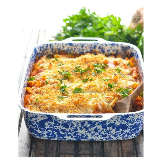 Chicken Parmesan Dump and Bake meal. A delicious and easy dish that requires no cooking of pasta or chicken. Simply mix, dump, and bake for a tasty meal!