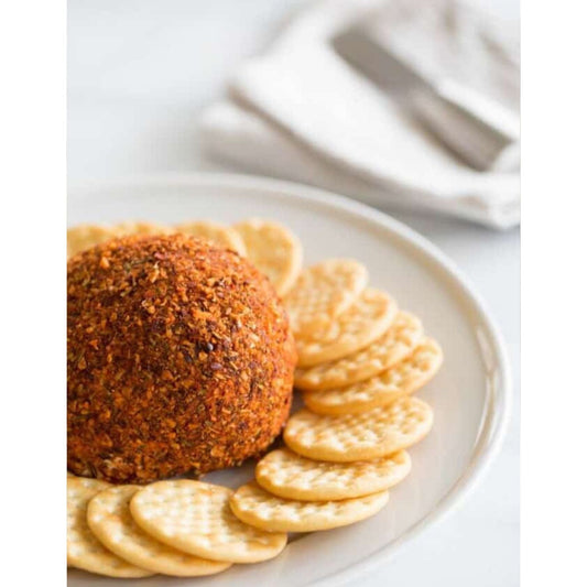 Chipotle Cheeseball mix - A plate with crackers and a spicy cheese ball mix, ready to be enjoyed as a delicious appetizer. Enough mix for 2 batches.