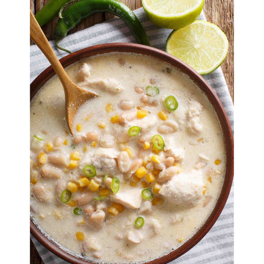 Chicken and corn chowder in a bowl, a hearty and comforting soup with tender chicken and sweet corn kernels.